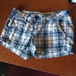 Blue and white plaid shorts